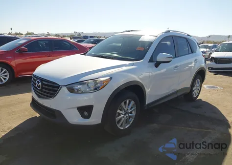 2016 Mazda Cx-5 Touring z USA, uszkodzony, nr VIN JM3KE2CY8G0776840